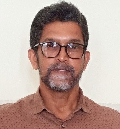 VINOD E